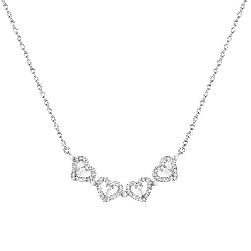 Collar con corazon de trebol de cuatro hojas