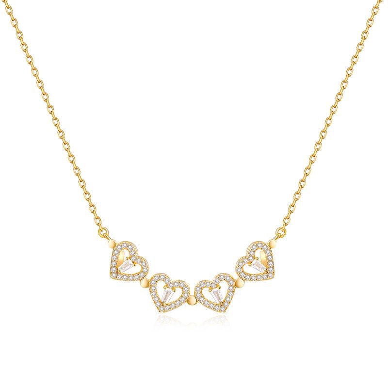 Collar con corazon de trebol de cuatro hojas